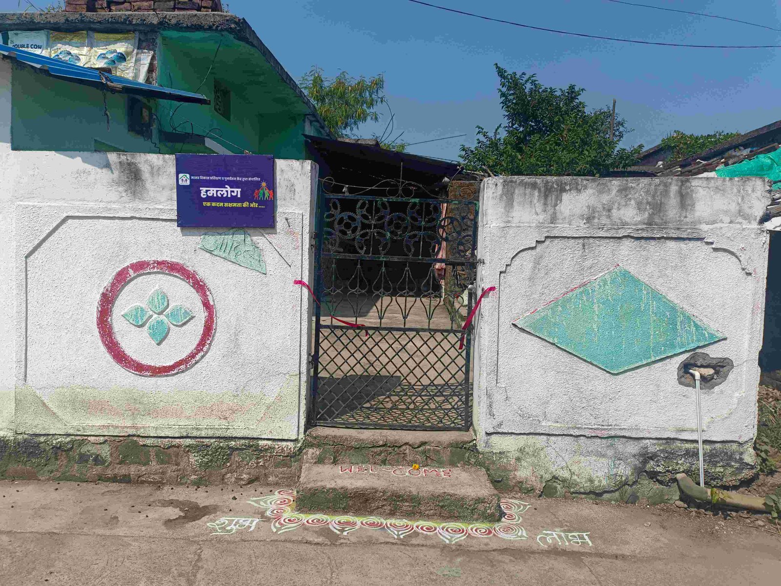 UDAAN capacity building training three people at table healthcare worker skills development