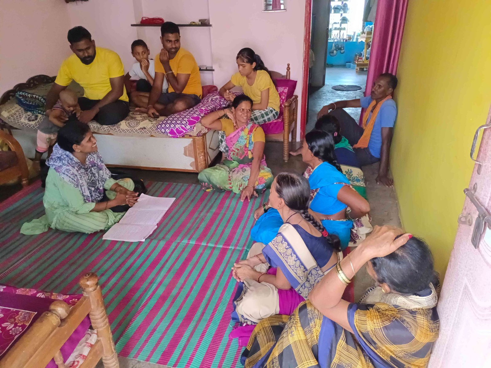 UDAAN family counseling two women sitting side by side caregiver education mental health