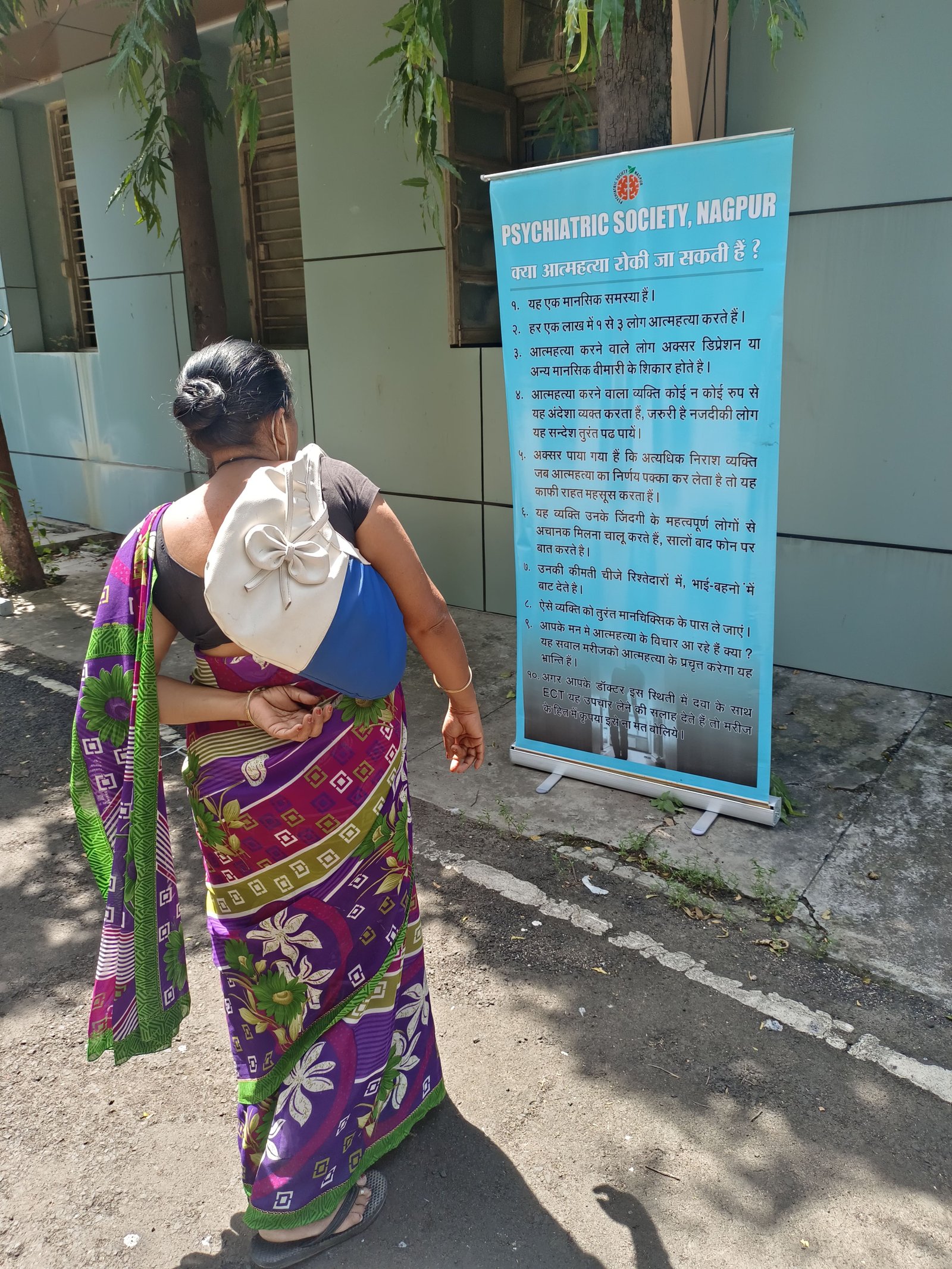 UDAAN program effectiveness evidence-based mental health care delivery two people talking in office